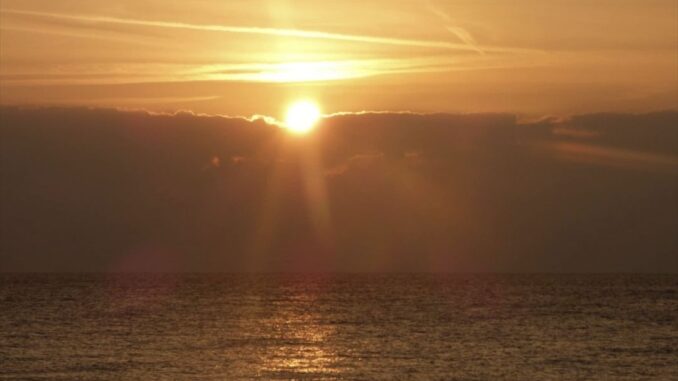 come il sole all'improvviso sul mare