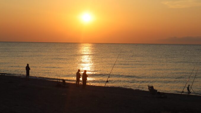pesca il sole pescatore